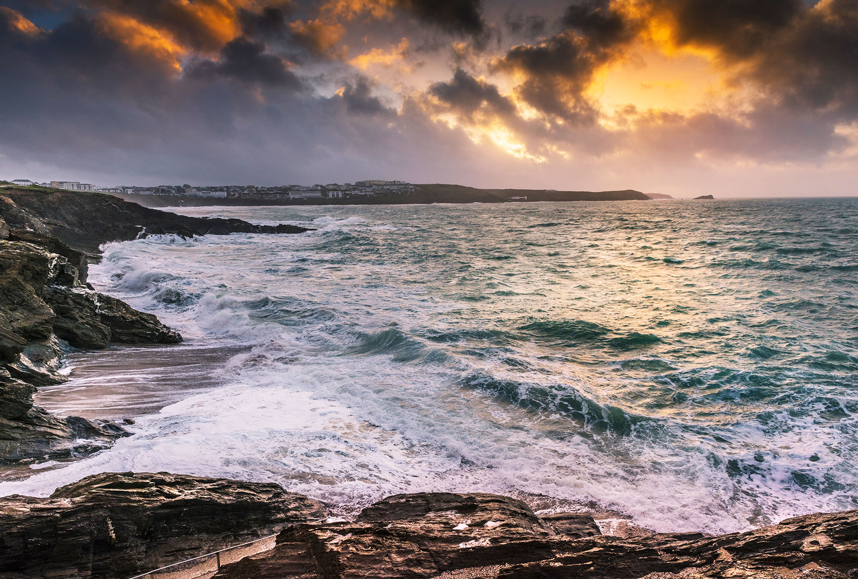 Sunset over crashing ocean currents (Gordon Scammell/Loop Images/Universal Images Group via Getty Images)