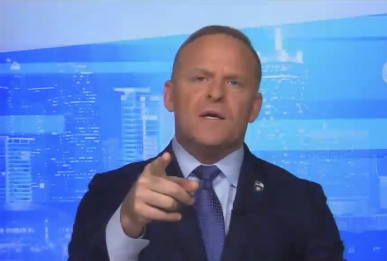 Newsmax host Grant Stinchfield during a Thursday segment in which he cut off a guest's microphone and screamed that he would not tolerate any criticism of former President Donald Trump. (Newsmax/Screengrab)