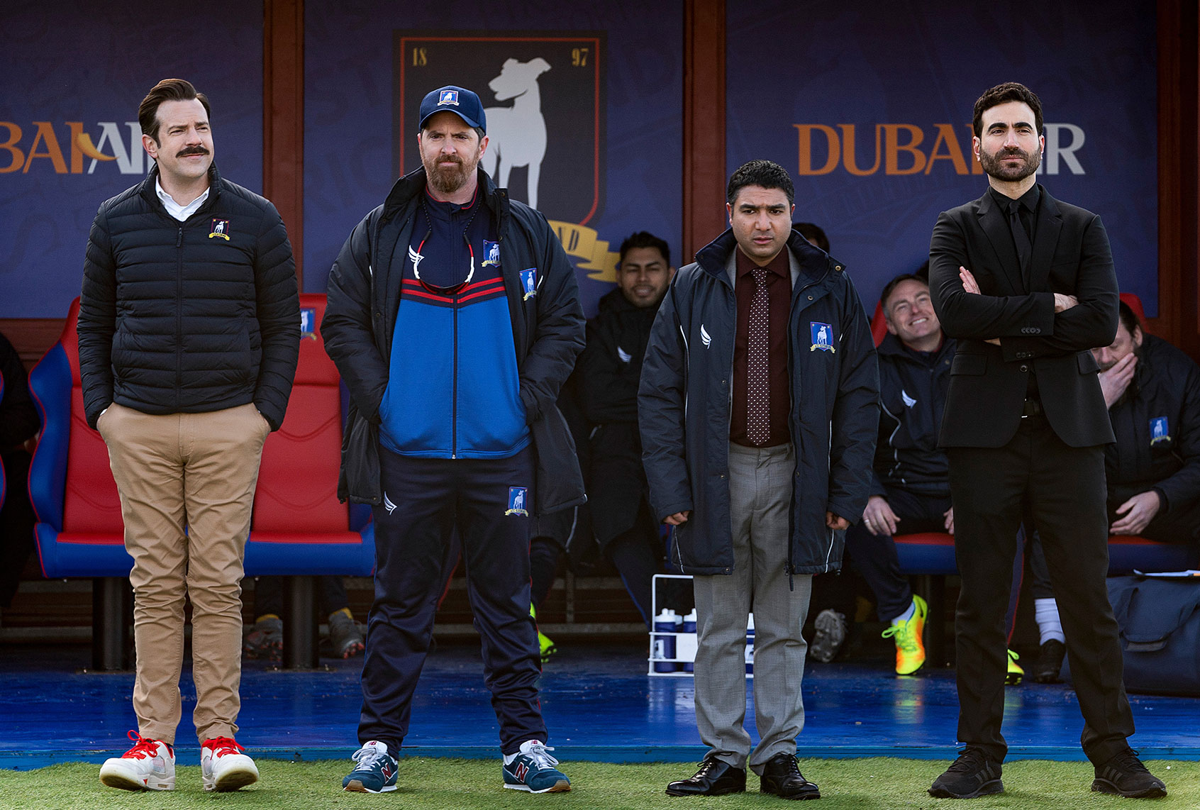 In "Ted Lasso," Coach Beard (Brendan Hunt) wears New Balance shoes, subtle product placement (until he later props his feet on a desk) (Apple TV+)
