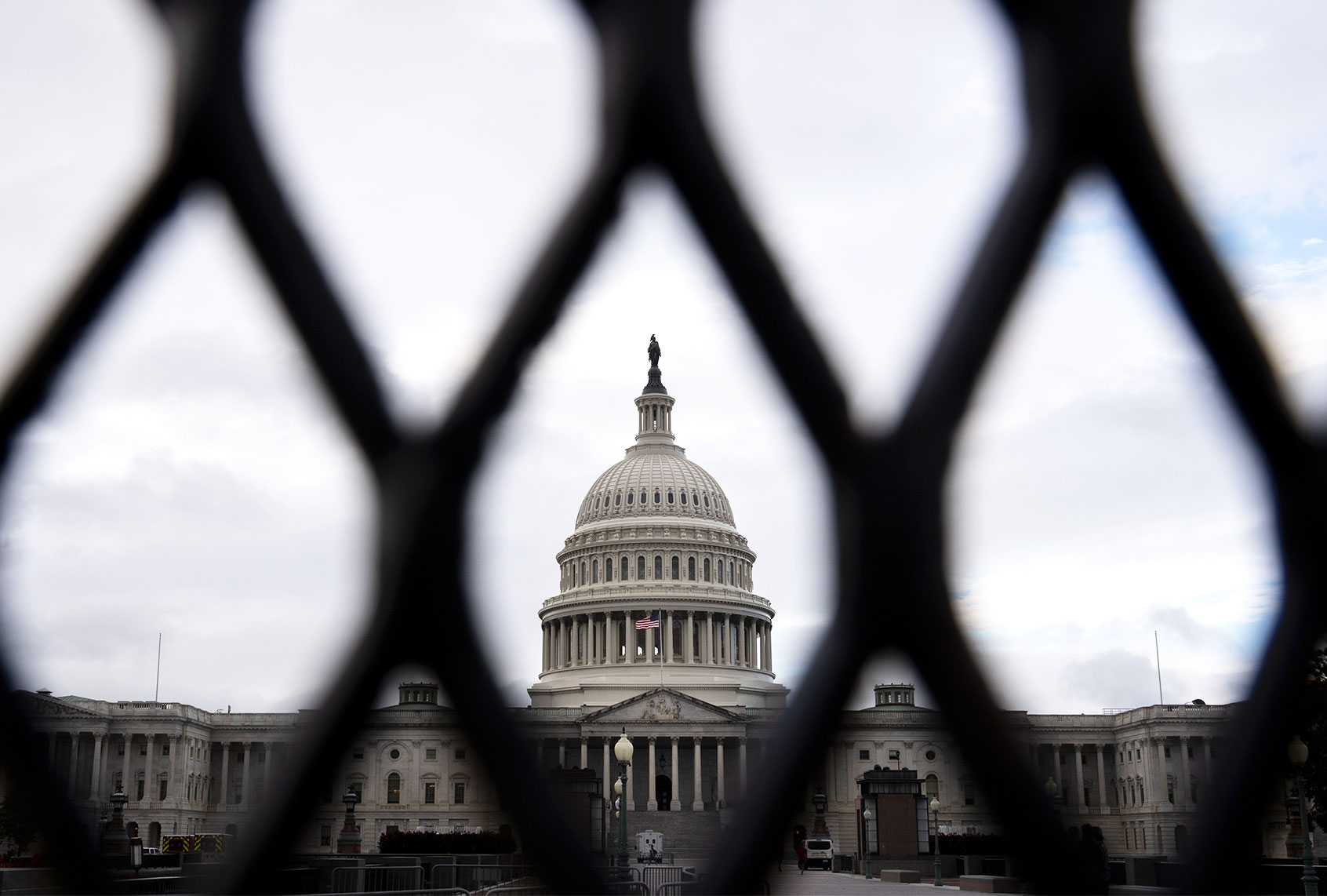 The U.S. Capitol stands behind security fencing on September 17, 2021 in Washington, DC. Security in the Washington, DC been increased in preparation for the Justice for J6 Rally, a rally happening this weekend in Washington for support for those who rioted at the U.S. Capitol on January 6 to protest the 2020 presidential election outcome. (Drew Angerer/Getty Images)