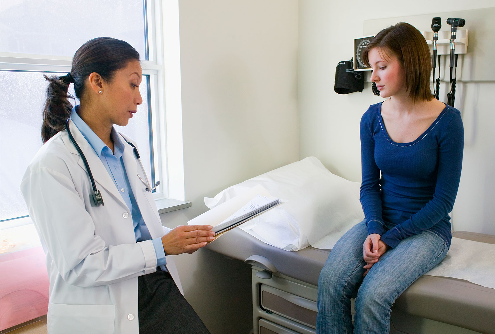 Doctor Talking with Patient (Getty Images/Jim Craigmyle)