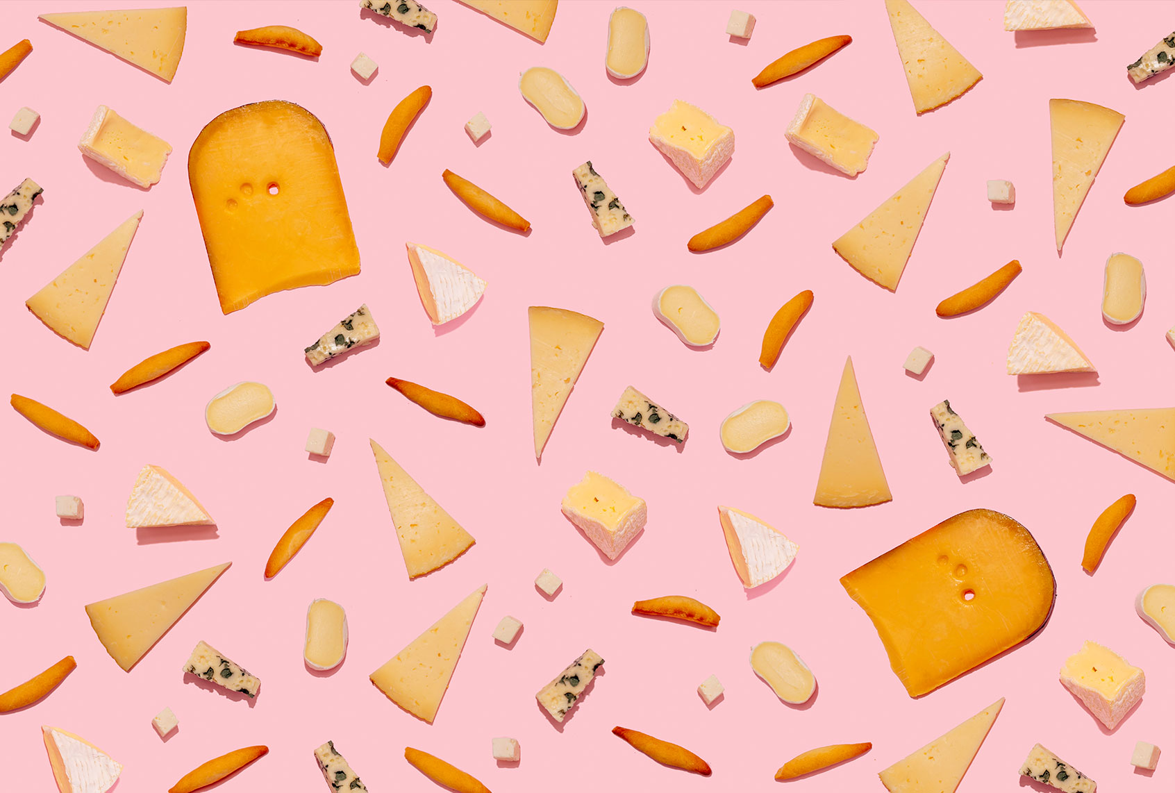 Varieties of cheese and bread sticks (Getty Images/Westend61)