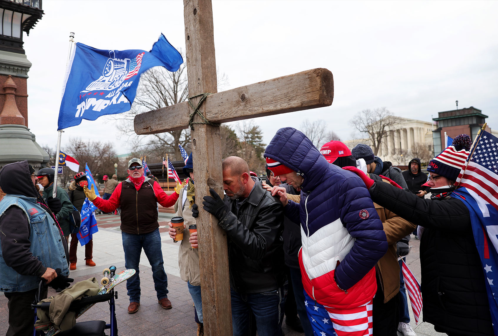 Supporters of U.S. President Donald Trump pray outside the U.S. Capitol January 06, 2021 in Washington, DC. (Win McNamee/Getty Images)