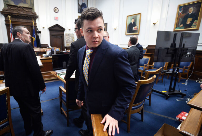 Kyle Rittenhouse, center, enters the courtroom after a break at the Kenosha County Courthouse on November 11, 2021 in Kenosha, Wisconsin. Rittenhouse is accused of shooting three demonstrators, killing two of them, during a night of unrest that erupted in Kenosha after a police officer shot Jacob Blake seven times in the back while being arrested in August 2020. Rittenhouse, from Antioch, Illinois, was 17 at the time of the shooting and armed with an assault rifle. He faces counts of felony homicide and felony attempted homicide. (Sean Krajacic-Pool/Getty Images)