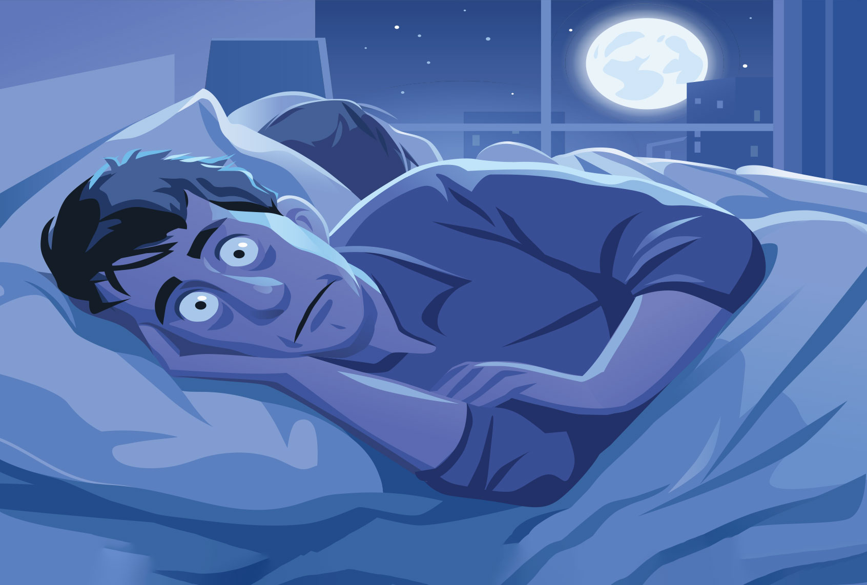 Man lying in his bed, trying to sleep (Getty Images/kbeis)