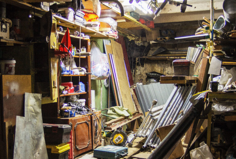 Big mess in an over stuffed suburban garage (Getty Images/Denis Torkhov)