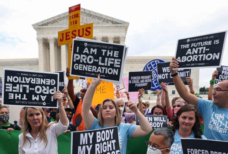 Pro-choice and anti-abortion activists protest alongside each other during a demonstration outside of the Supreme Court on October 04, 2021 in Washington, DC. The Supreme Court's new term, which started today is expected to take up contentious issues including an abortion rights case that is a direct challenge to Roe v. Wade. (Kevin Dietsch/Getty Images)