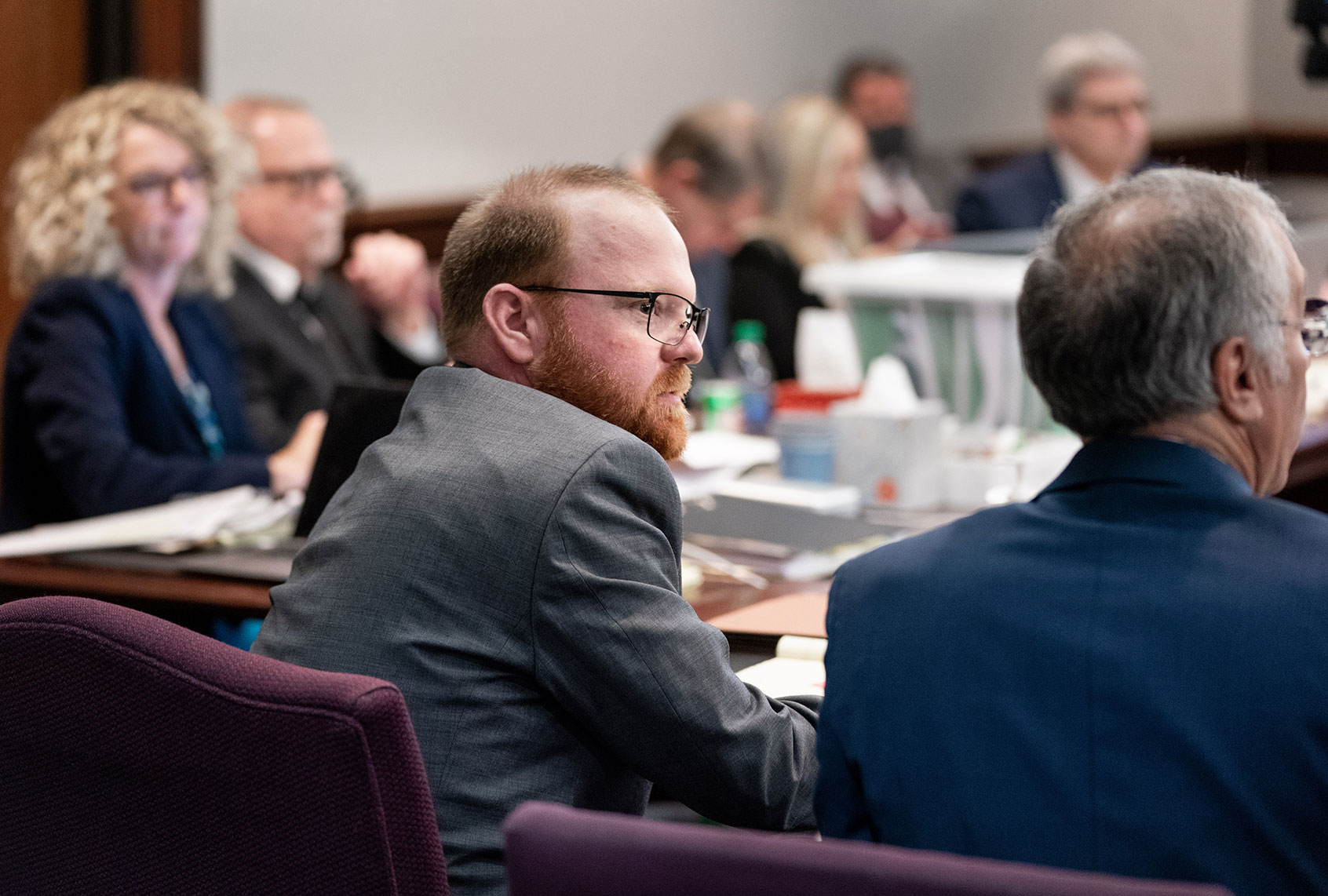 Defendant Travis McMichael observes court proceedings during the trial for Ahmaud Arbery's shooting death at the Glynn County Courthouse on November 8, 2021 in Brunswick, Georgia. Greg McMichael and his son, Travis McMichael, and a neighbor, William "Roddie" Bryan, are charged with the February 2021 slaying of 25-year-old Ahmaud Arbery. (Sean Rayford/Getty Images)