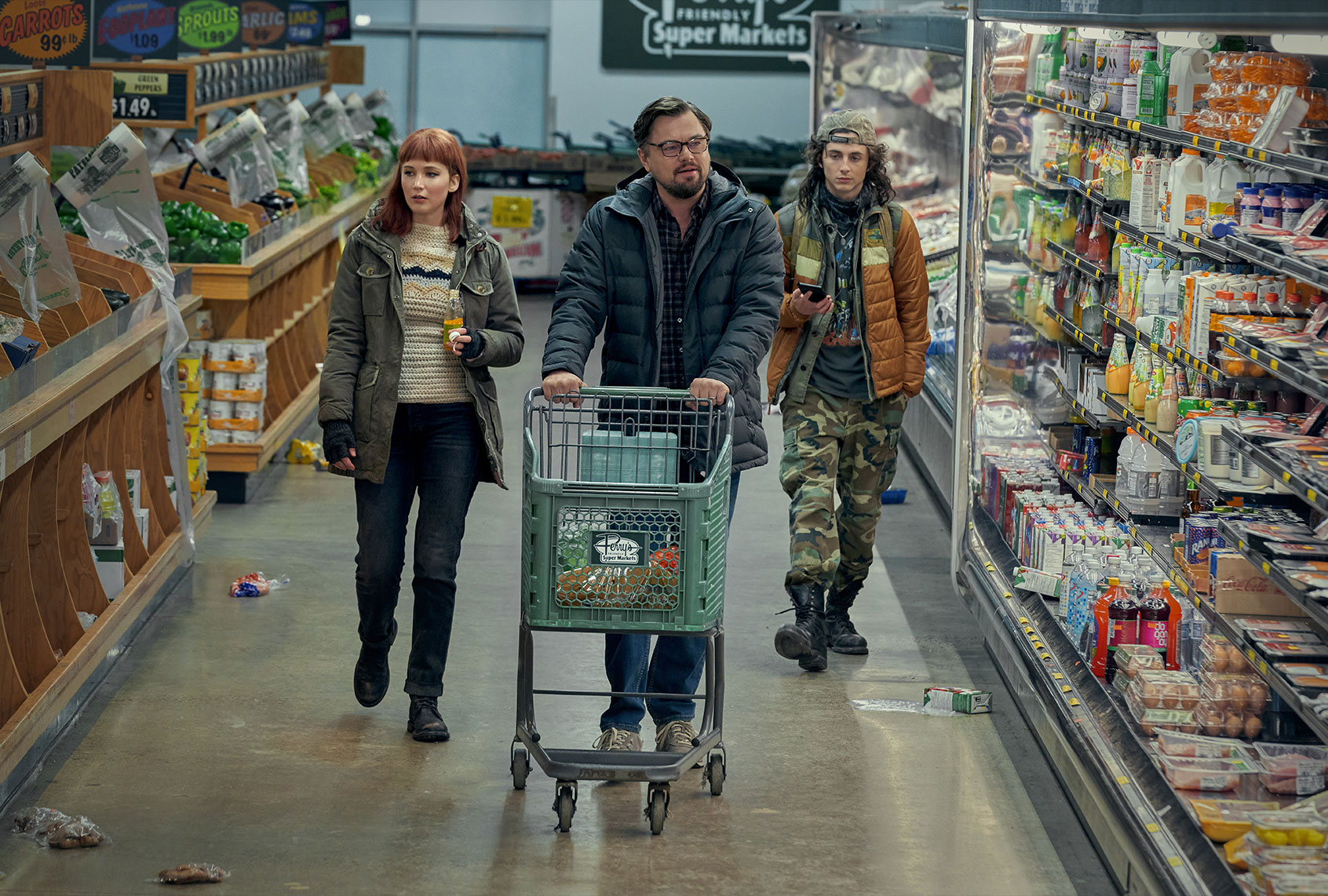 Jennifer Lawrence as Kate Dibiasky, Leonardo DiCaprio as Dr. Randall Mindy, and Timothée Chalamet as Yul in "Don't Look Up" (Niko Tavernise/Netflix)