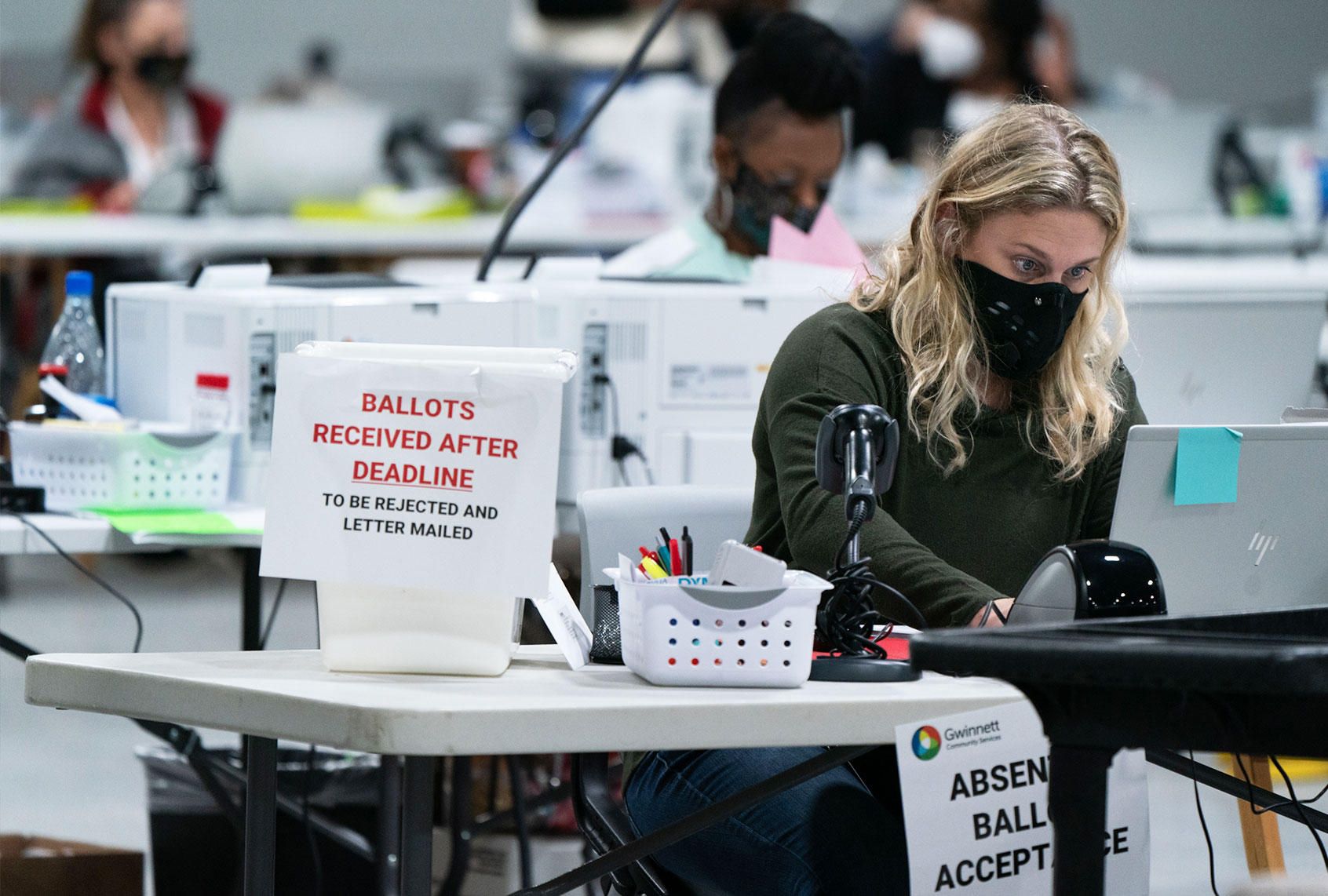Election personnel check in provisional ballots at the Gwinnett County Board of Voter Registrations and Elections offices on November 7, 2020 in Lawrenceville, Georgia. (Elijah Nouvelage/Getty Images)