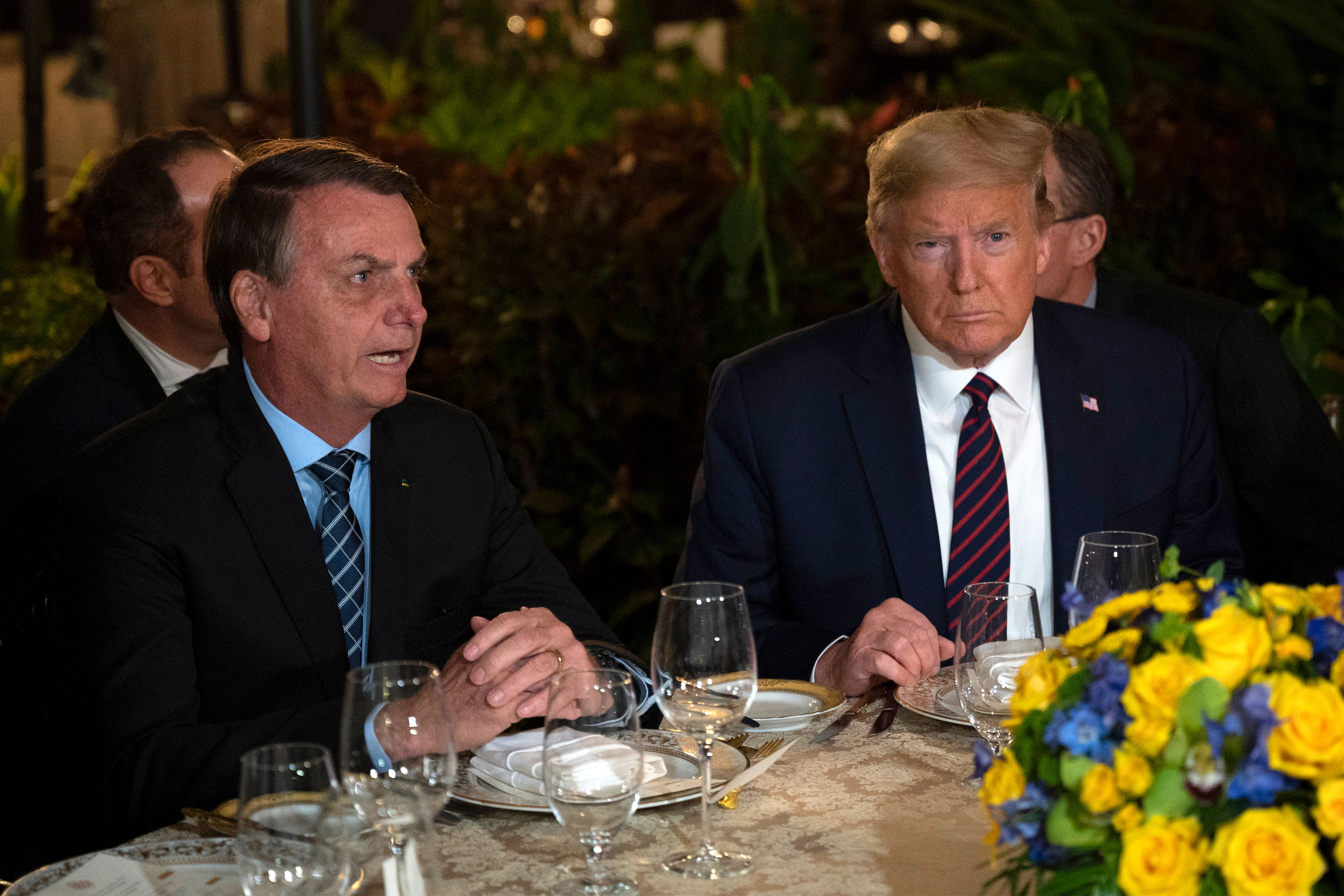 Then-President Donald Trump with Brazilian President Jair Bolsonaro at Mar-a-Lago in Palm Beach, Florida, on March 7, 2020. ( Jim Watson/AFP via Getty Images)