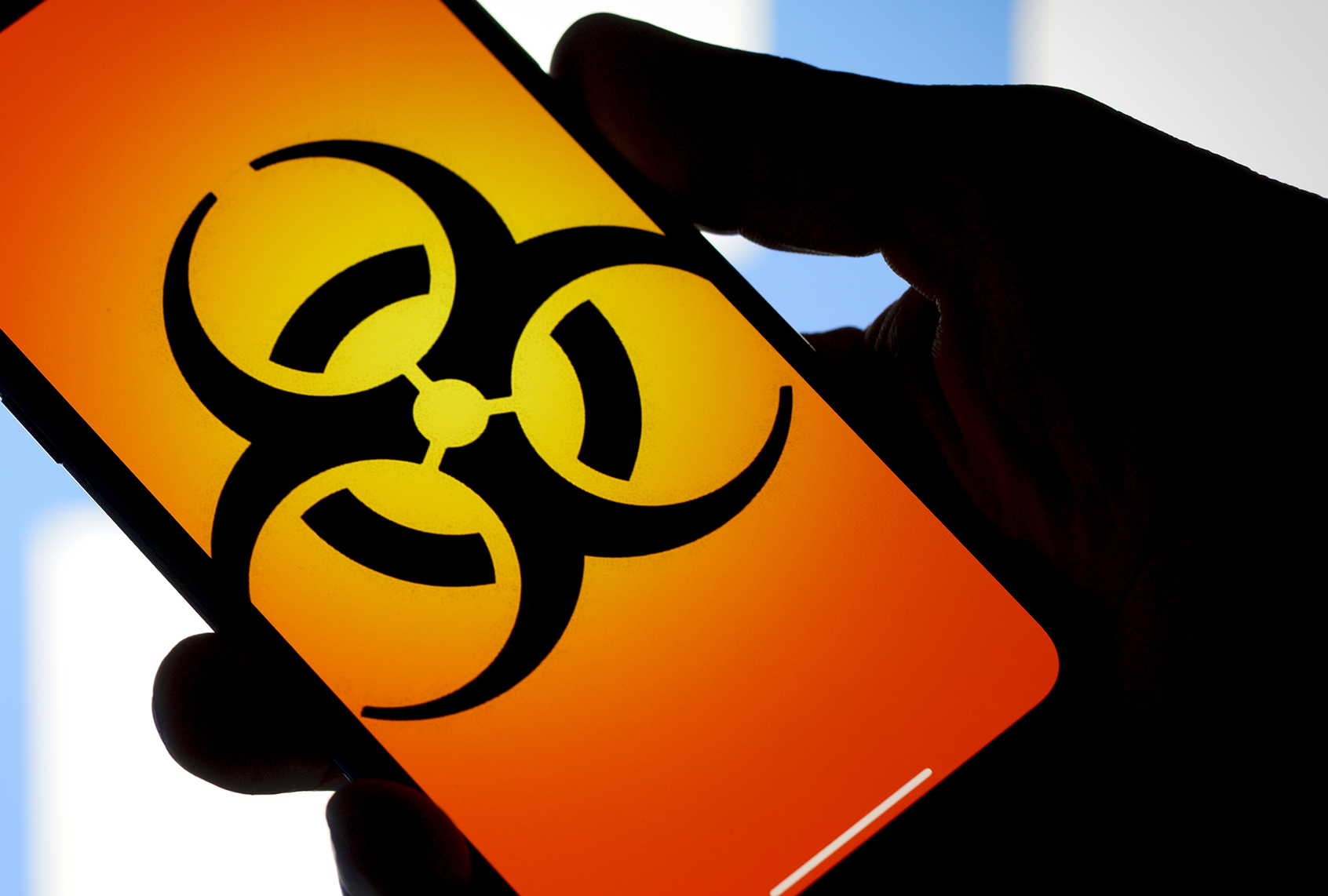 Biohazard sign on a phone. (Getty Images)