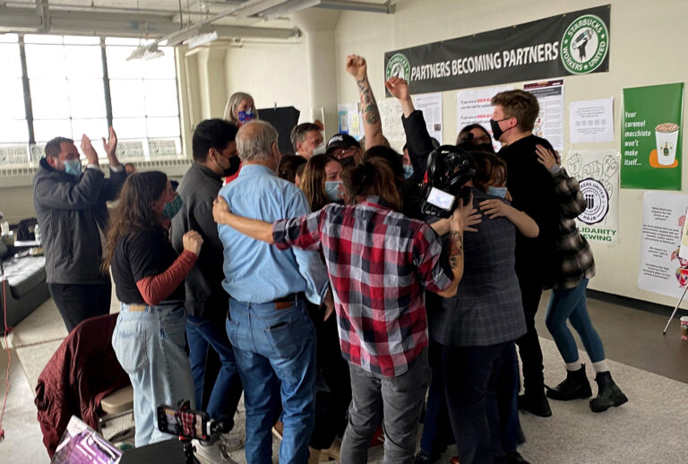 Starbucks employees celebrate after unionization votes are counted on December 9, 2021 in Buffalo, New York. (Eleonore SENS / AFP)