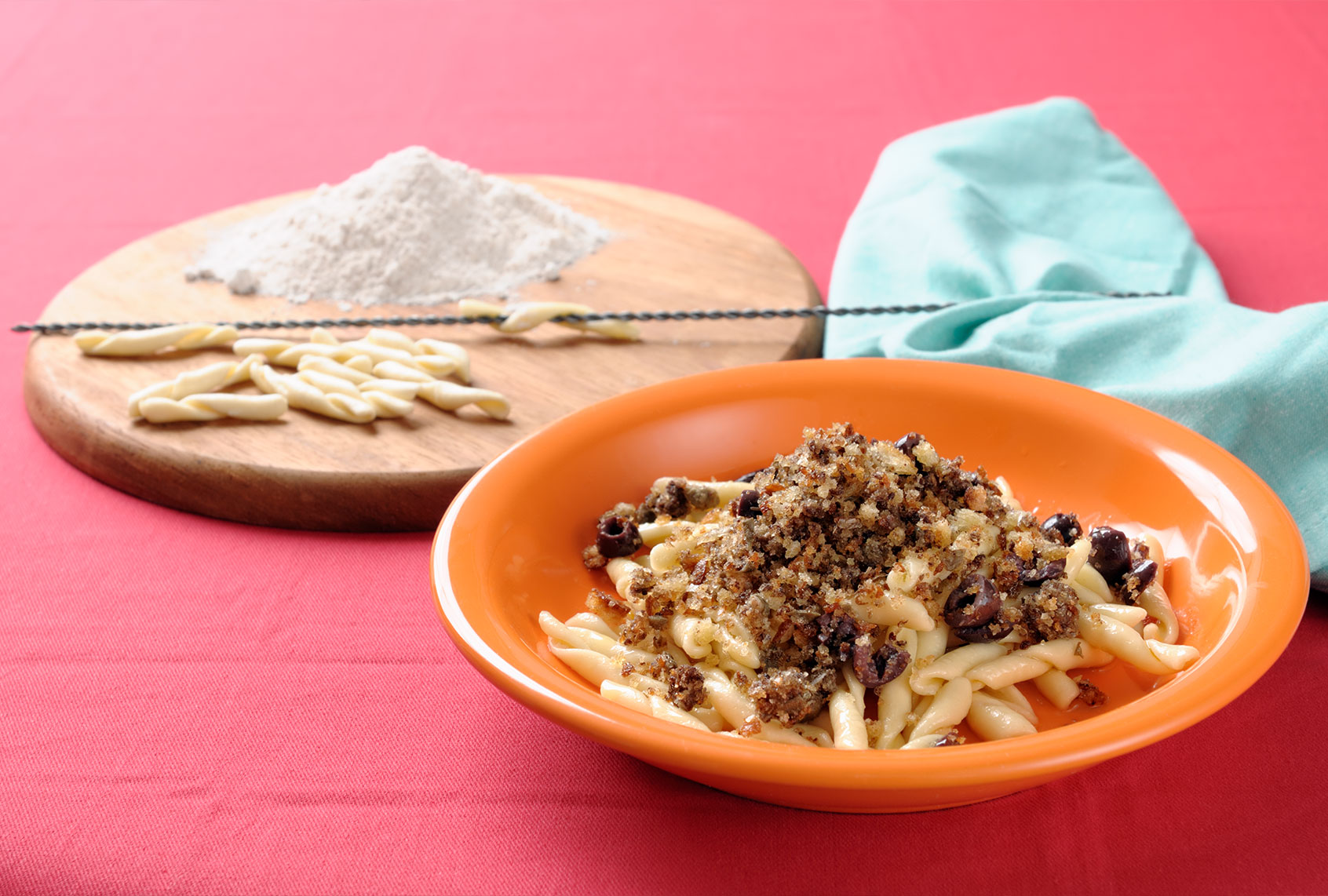 Homemade Maccheroncini pasta with crusty bread (Getty Images/Fabio Bianchini)