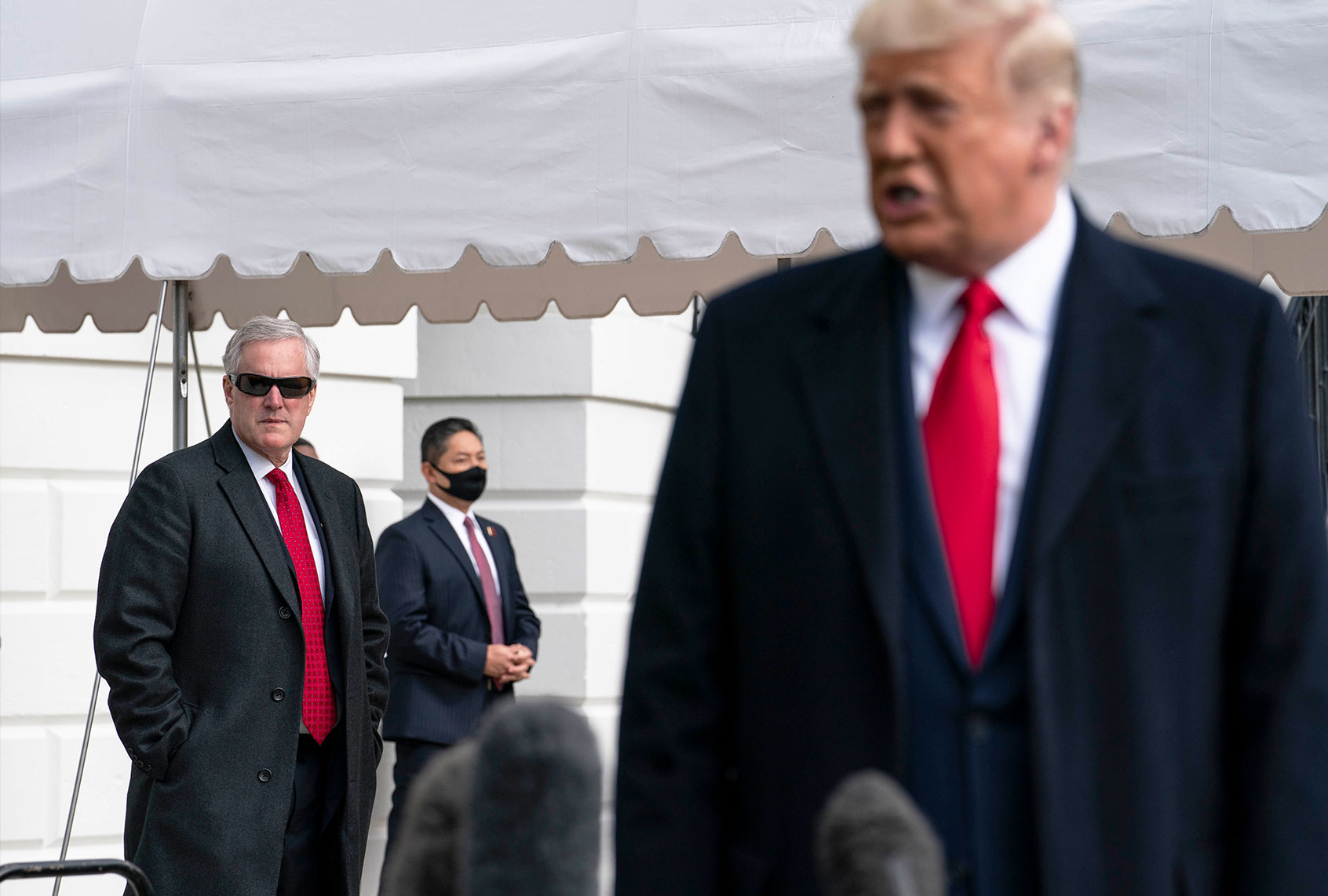 White House Chief of Staff Mark Meadows listens as President Donald Trump speaks to the press outside the White House on October 30, 2020 in Washington, DC. (Sarah Silbiger/Getty Images)