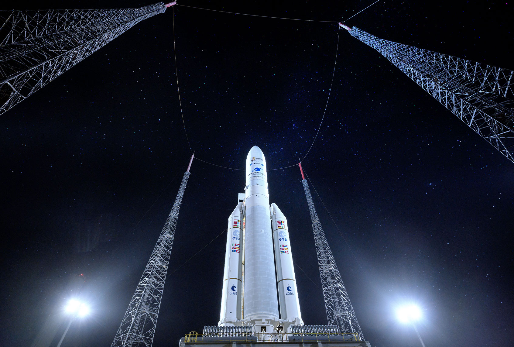 Arianespace's Ariane 5 rocket with NASAs James Webb Space Telescope onboard, is seen at the launch pad December 23, 2021 at Europes Spaceport, the Guiana Space Center in Kourou, French Guiana. The James Webb Space Telescope (sometimes called JWST or Webb) is a large infrared telescope with a 21.3 foot (6.5 meter) primary mirror. The observatory will study every phase of cosmic historyfrom within our solar system to the most distant observable galaxies in the early universe. (Bill Ingalls/NASA via Getty Images)