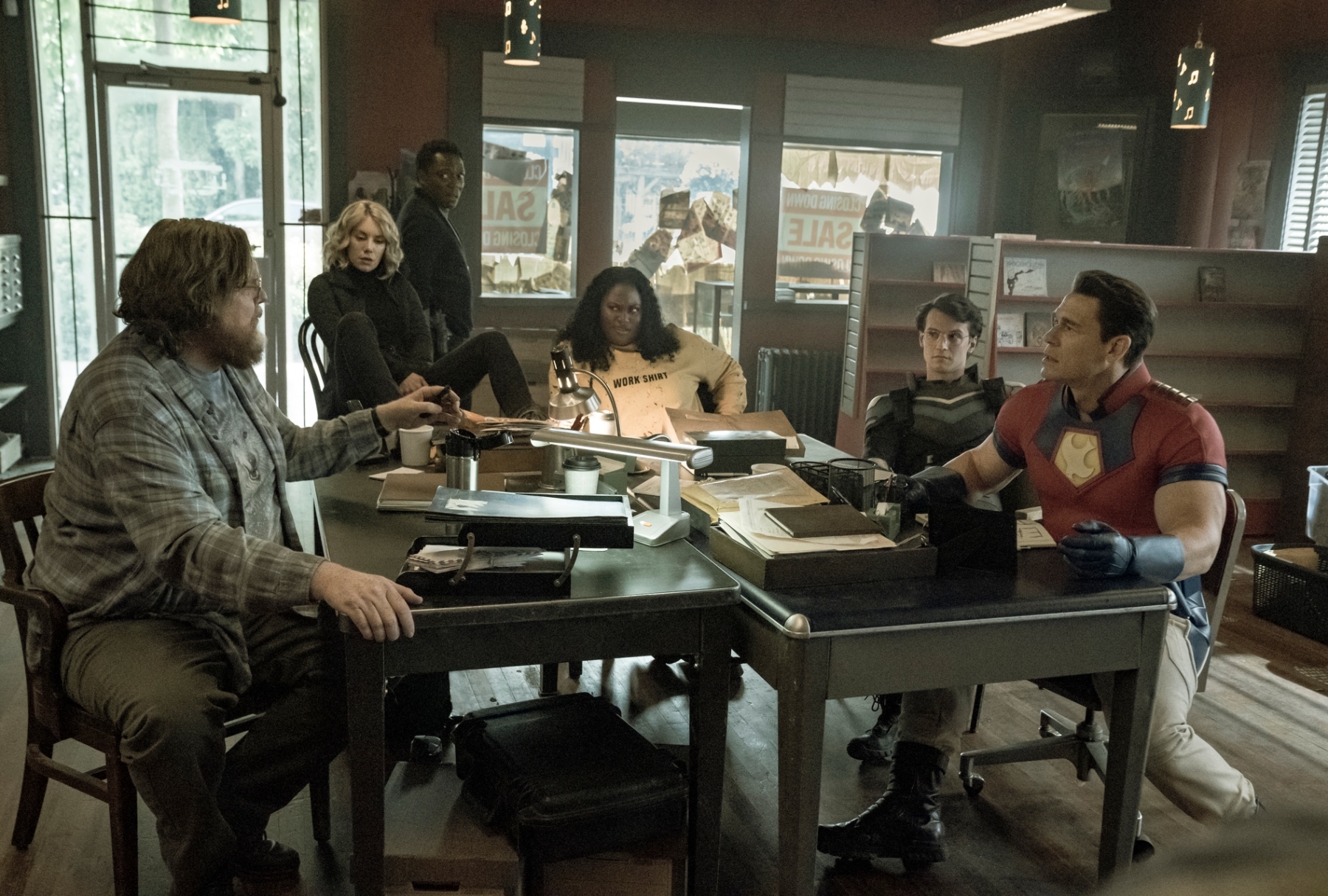 Economos (Steve Agee), Harcourt (Jennifer Holland), Murn (Chukwudi Iwuji), Adebayo (Danielle Brooks), Vigilante (Freddie Stroma), Peacemaker (John Cena) in "Peacemaker" (HBO Max)