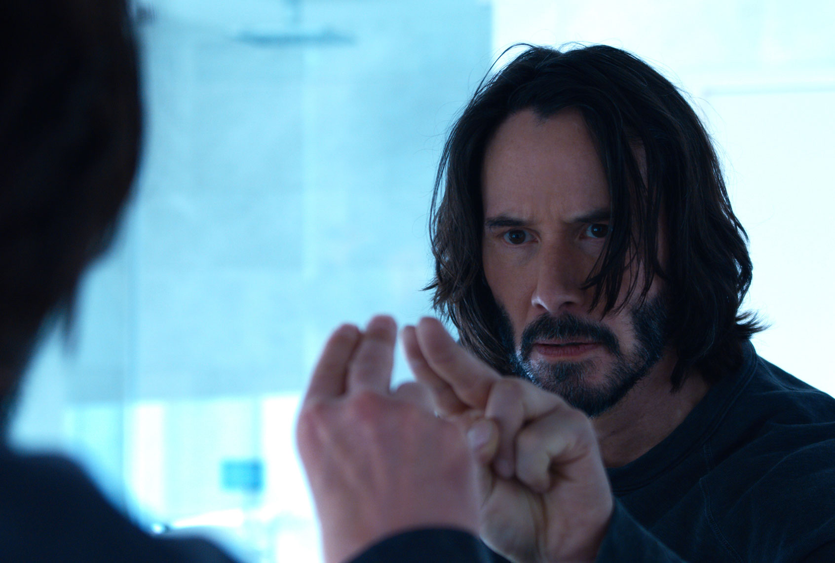 Keanu Reeves as Neo/Thomas Anderson in “The Matrix Resurrection" (Courtesy of Warner Bros. Pictures)