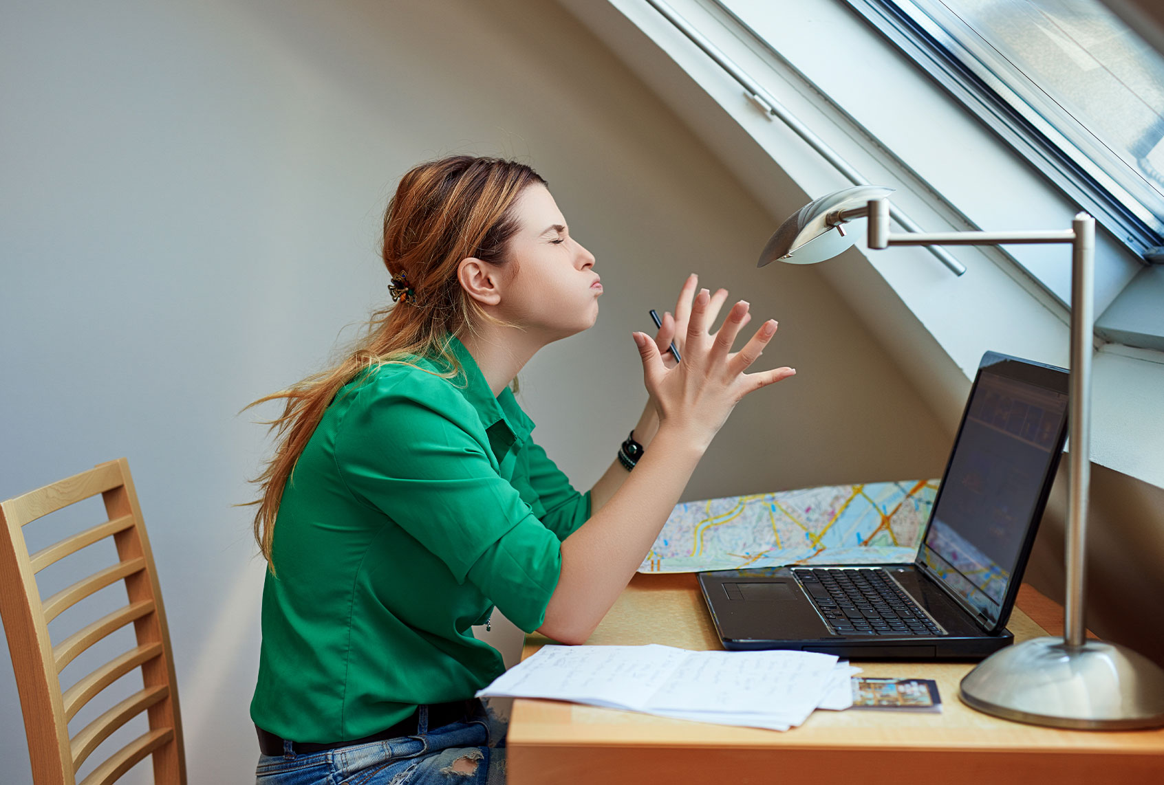 Woman working from home, feeling angry (Getty Images/stock_colors)