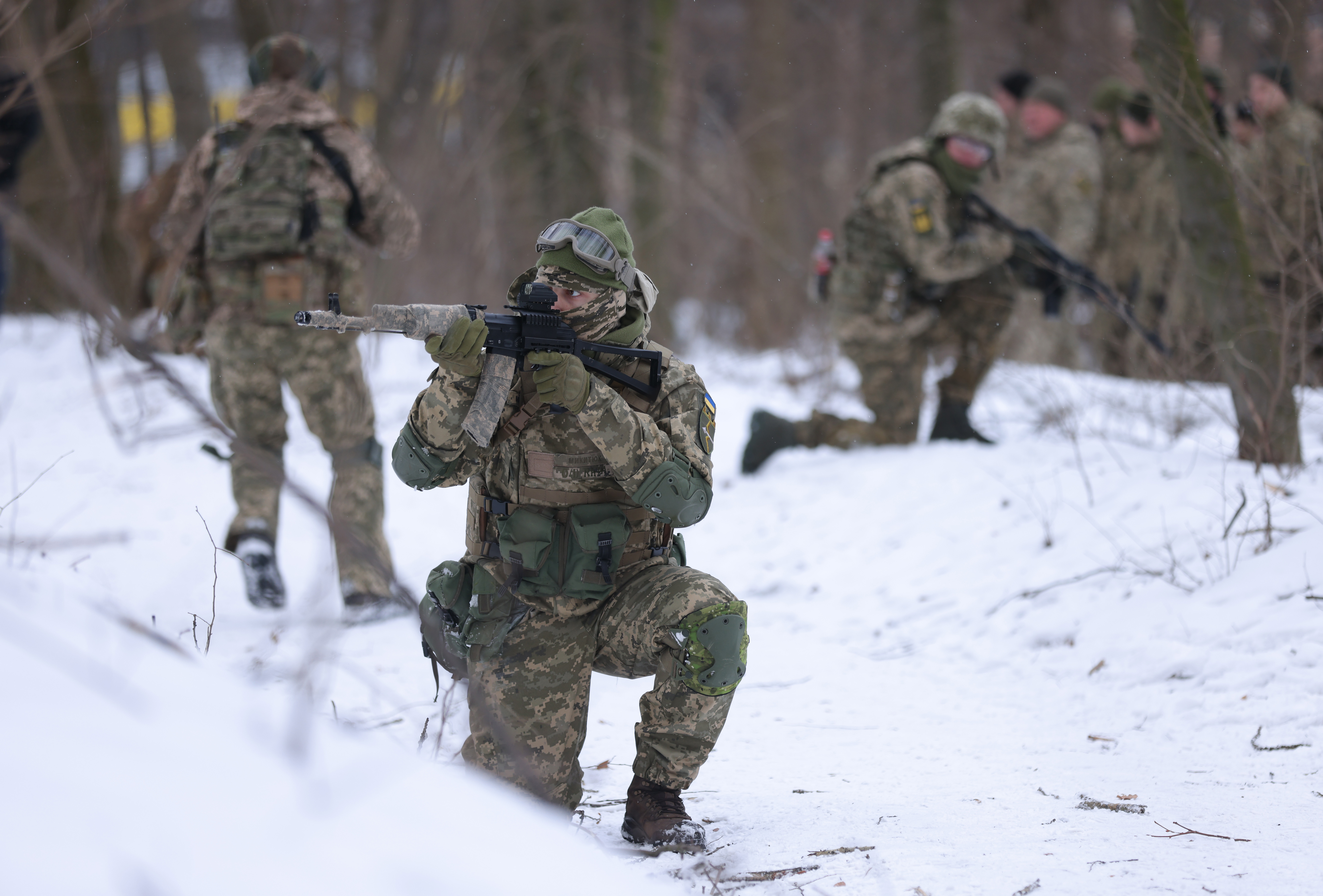 Civilian participants in a Kyiv Territorial Defence unit train in a forest on Jan. 22, 2022, in Kyiv, Ukraine. (Sean Gallup/Getty Images)