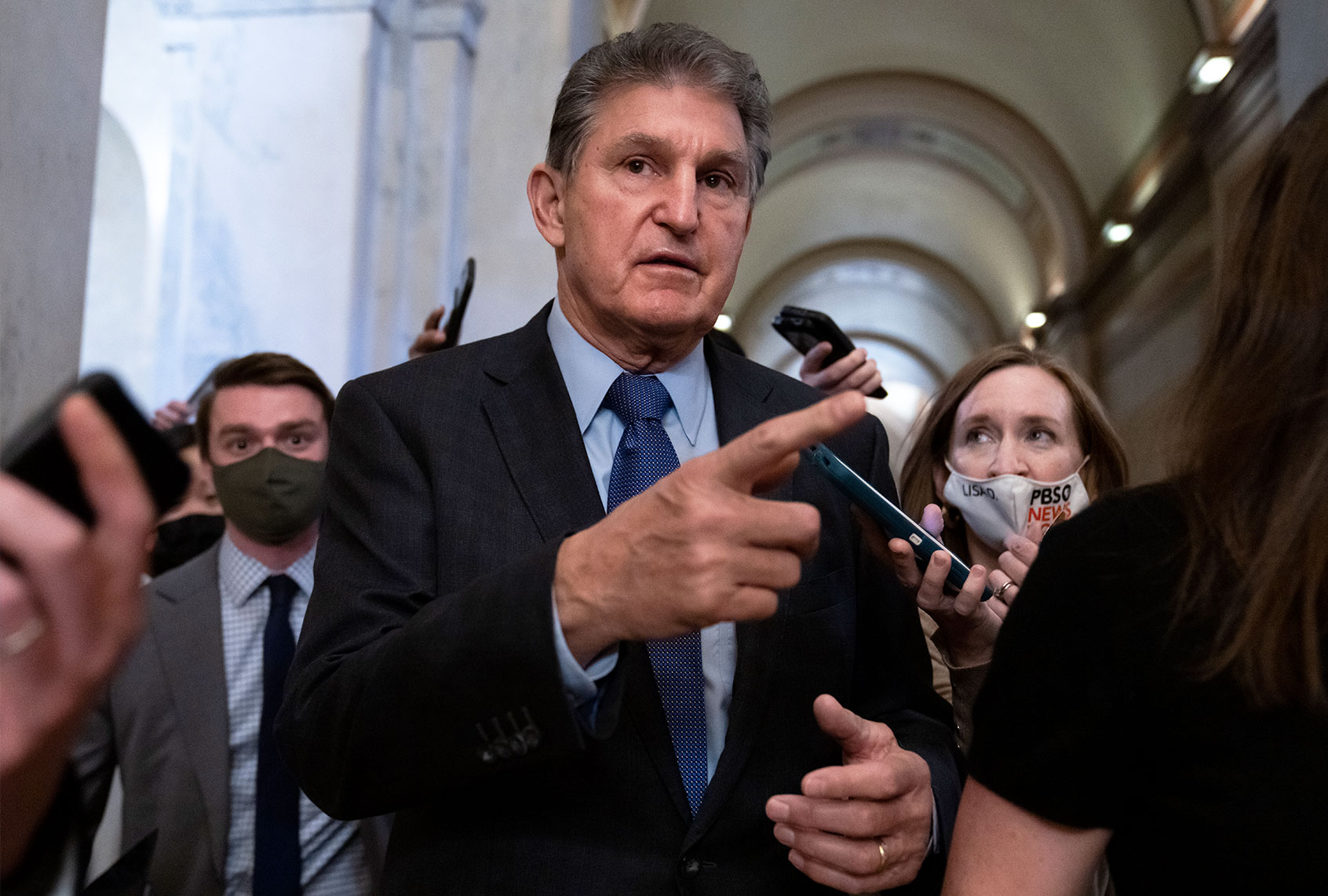 Sen. Joe Manchin, D-W.Va., talks with reporters in the U.S. Capitol (Tom Williams/CQ-Roll Call, Inc via Getty Images)