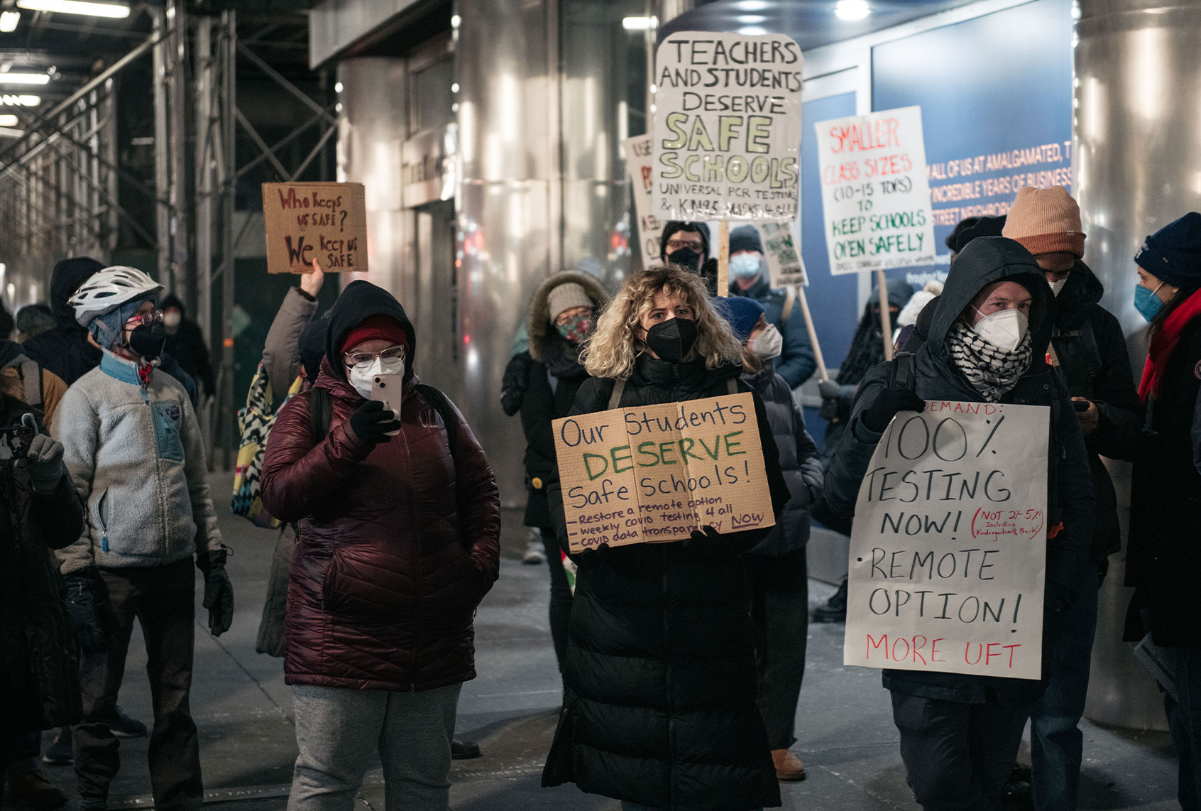 Demonstrators including New York City public school teachers and school staff attend a rally demanding increased COVID-19 safety measures and a remote learning option on January 10, 2022 in New York City. Educators have denounced Mayor Eric Adams, Department of Education Chancellor David Banks, and other city leaders for keeping schools open with no remote learning option amidst the city's surge of positive cases. (Scott Heins/Getty Images)