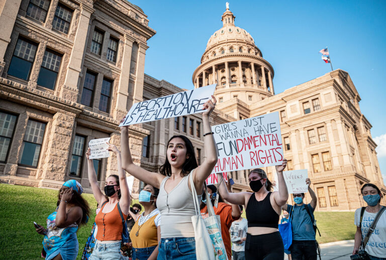Pro-choice protesters march outside the Texas State Capitol on Wednesday, Sept. 1, 2021 in Austin, TX. Texas passed SB8 which effectively bans nearly all abortions and it went into effect Sept. 1. A request to the Supreme Court to block the bill went unanswered and the Court still has yet to take any action on it. (Sergio Flores For The Washington Post via Getty Images)