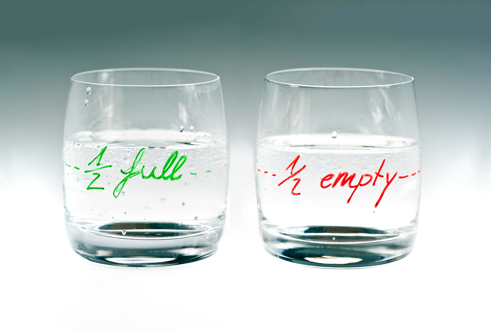 Glasses half-full and half-empty (Getty Images/wakila)