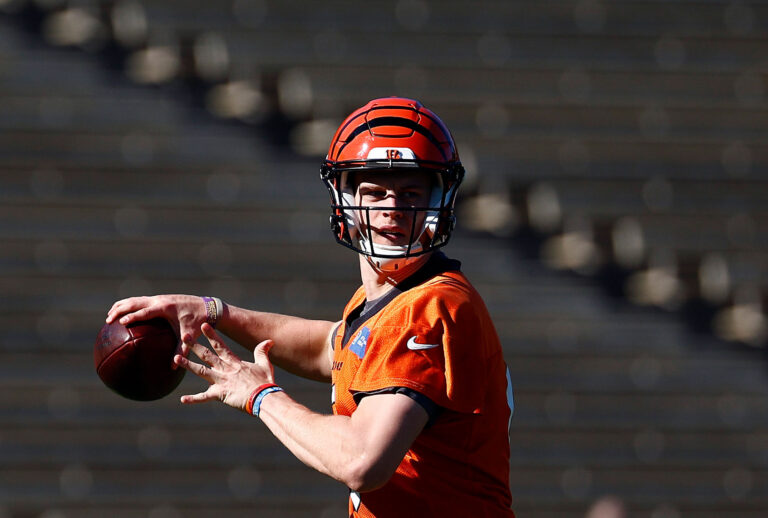 Joe Burrow #9 of the Cincinnati Bengals throws during practice in preparation for Super Bowl LVI at UCLA's Drake Stadium (Ronald Martinez/Getty Images)