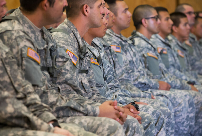 National Guard members listen to Texas Governor Rick Perry speak as he tours Texas Guard operations at Camp Swift east of Austin as troops prepare for an end of month deployment to the Texas border with Mexico. (Robert Daemmrich Photography Inc/Corbis via Getty Images)