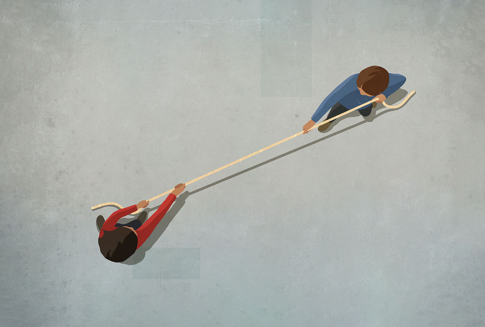Couple engaging in tug of war with rope (Getty Images/Malte Mueller)
