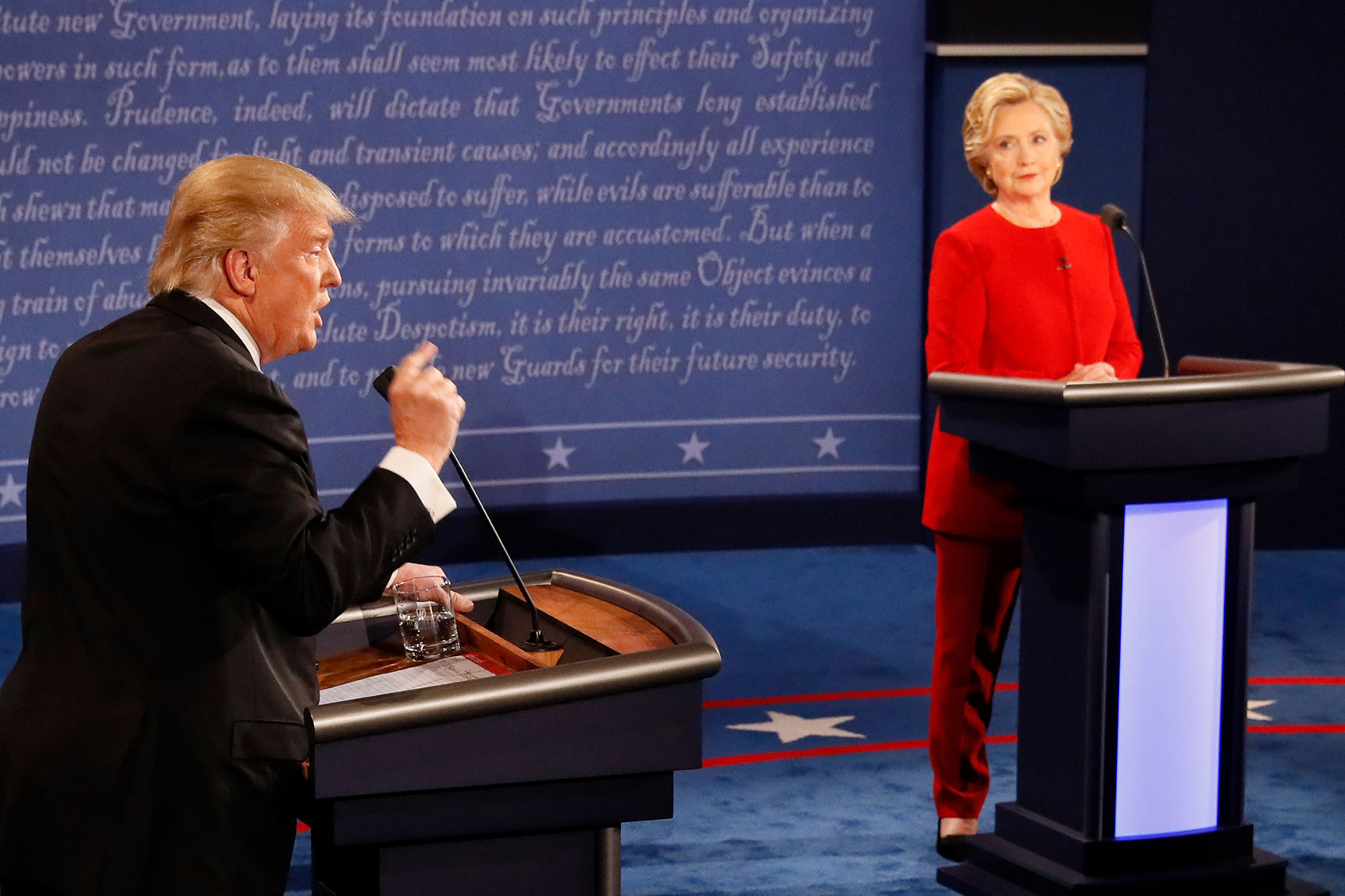 Democratic nominee Hillary Clinton (R) exchanges with Republican nominee Donald Trump (L) during the first presidential debate at Hofstra University in Hempstead, New York on September 26, 2016. (RICK WILKING/AFP via Getty Images)