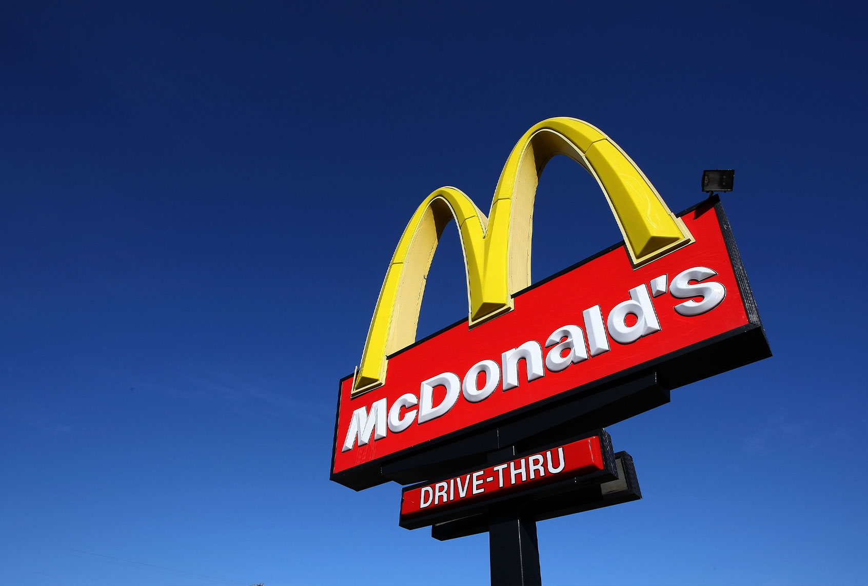 A sign stands outside of a McDonald's restaurant (Justin Sullivan/Getty Images)