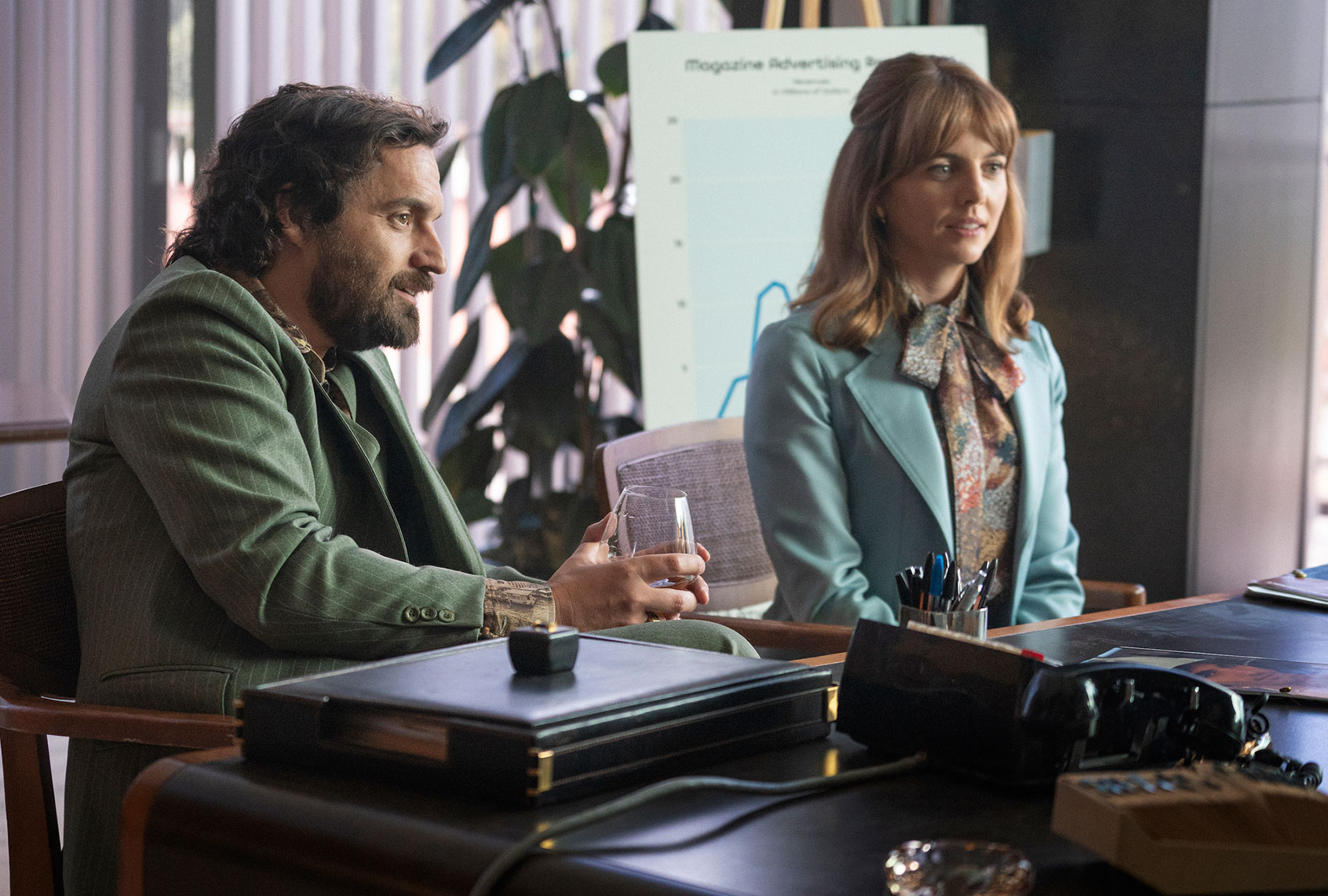 Jake Johnson and Ophelia Lovibond in "Minx" (Katrina Marcinowski/HBO ﻿Max)