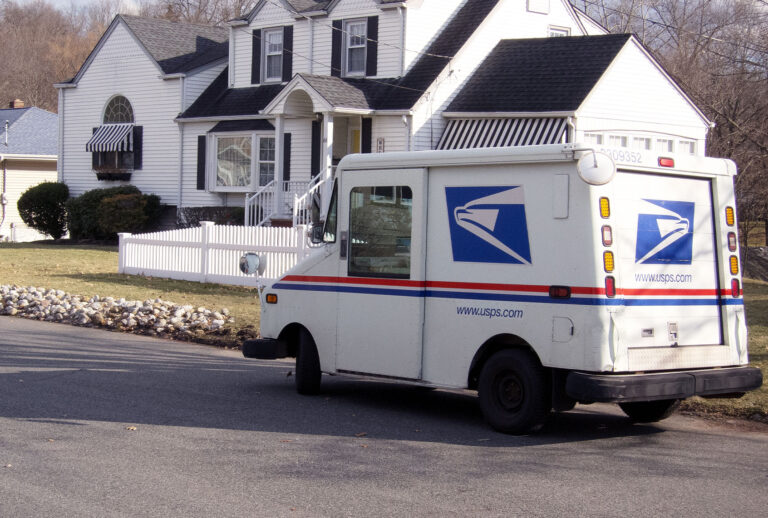 A U.S. Post Office truck sits parked in a suburban neighborhood February 10, 2022 in NORTH HALEDON, NJ. (Michael Bocchieri/Getty Images)