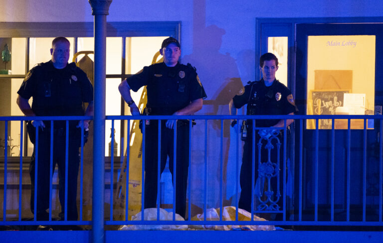 Tallahassee Police officers are stationed outside the HotYoga Studio after a gunman killed one person and injured several others inside on November 2, 2018 in Tallahassee, Florida. (Mark Wallheiser/Getty Images)
