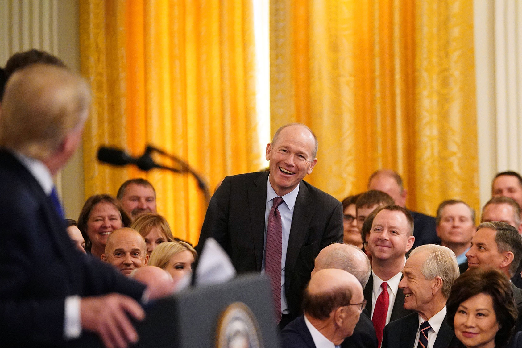 Boeing CEO Dave Calhoun is recognized during a ceremony to sign a trade agreement between the US and China in the East Room of the White House in Washington, DC, on January 15, 2020. (MANDEL NGAN/AFP via Getty Images)