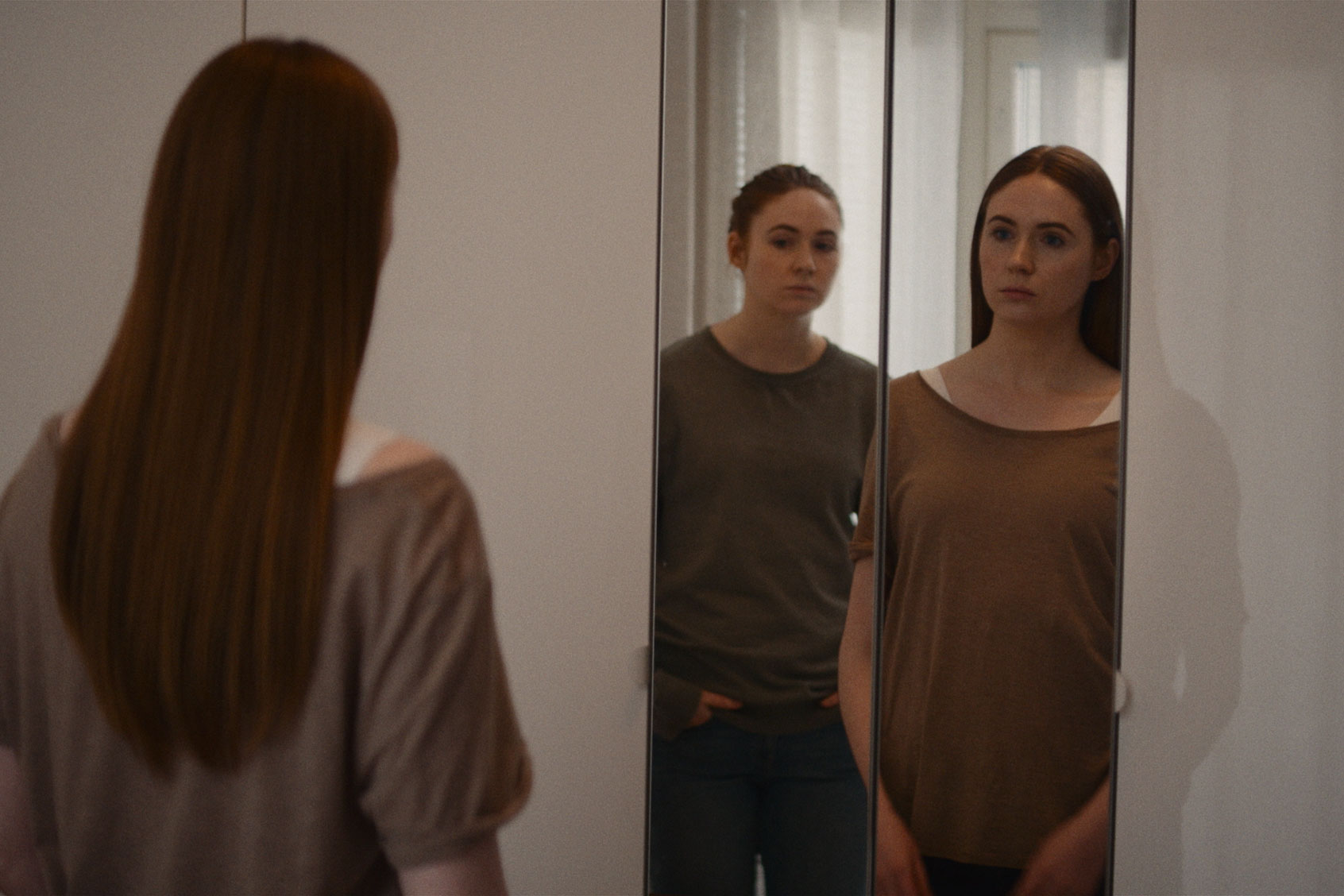 (L-R) Karen Gillan as Sarah and Karen Gillan as Clone Sarah in the sci-fi film, "Dual" (Photo courtesy of RLJE Films)