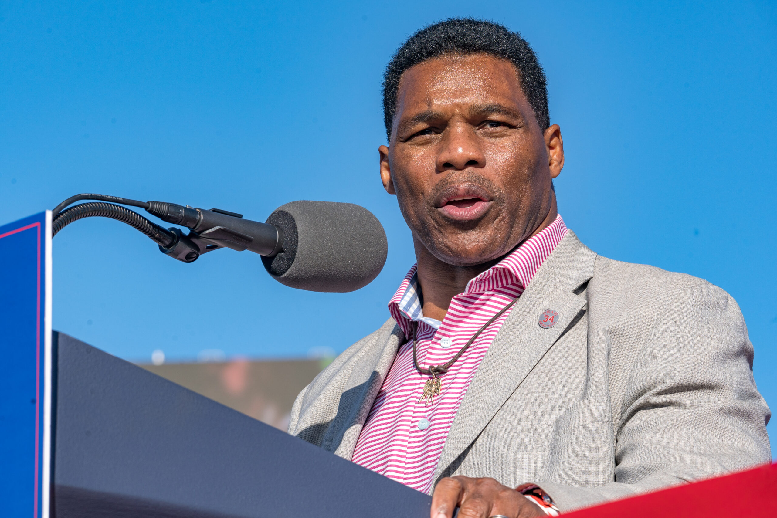 Candidate for US Senate Herschel Walker (R-GA) speaks to supporters of former U.S. President Donald Trump during a rally at the Banks County Dragway on March 26, 2022 in Commerce, Georgia. (Photo by Megan Varner/Getty Images)