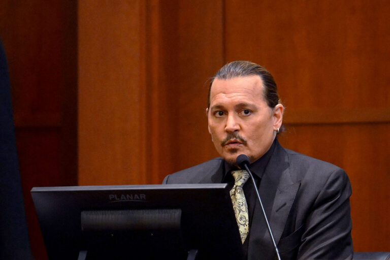 US actor Johnny Depp testifies during his defamation trial in the Fairfax County Circuit Courthouse in Fairfax, Virginia, on April 19, 2022. - Depp is suing ex-wife Amber Heard for libel after she wrote an op-ed piece in The Washington Post in 2018 referring to herself as a public figure representing domestic abuse. (JIM WATSON/POOL/AFP via Getty Images)