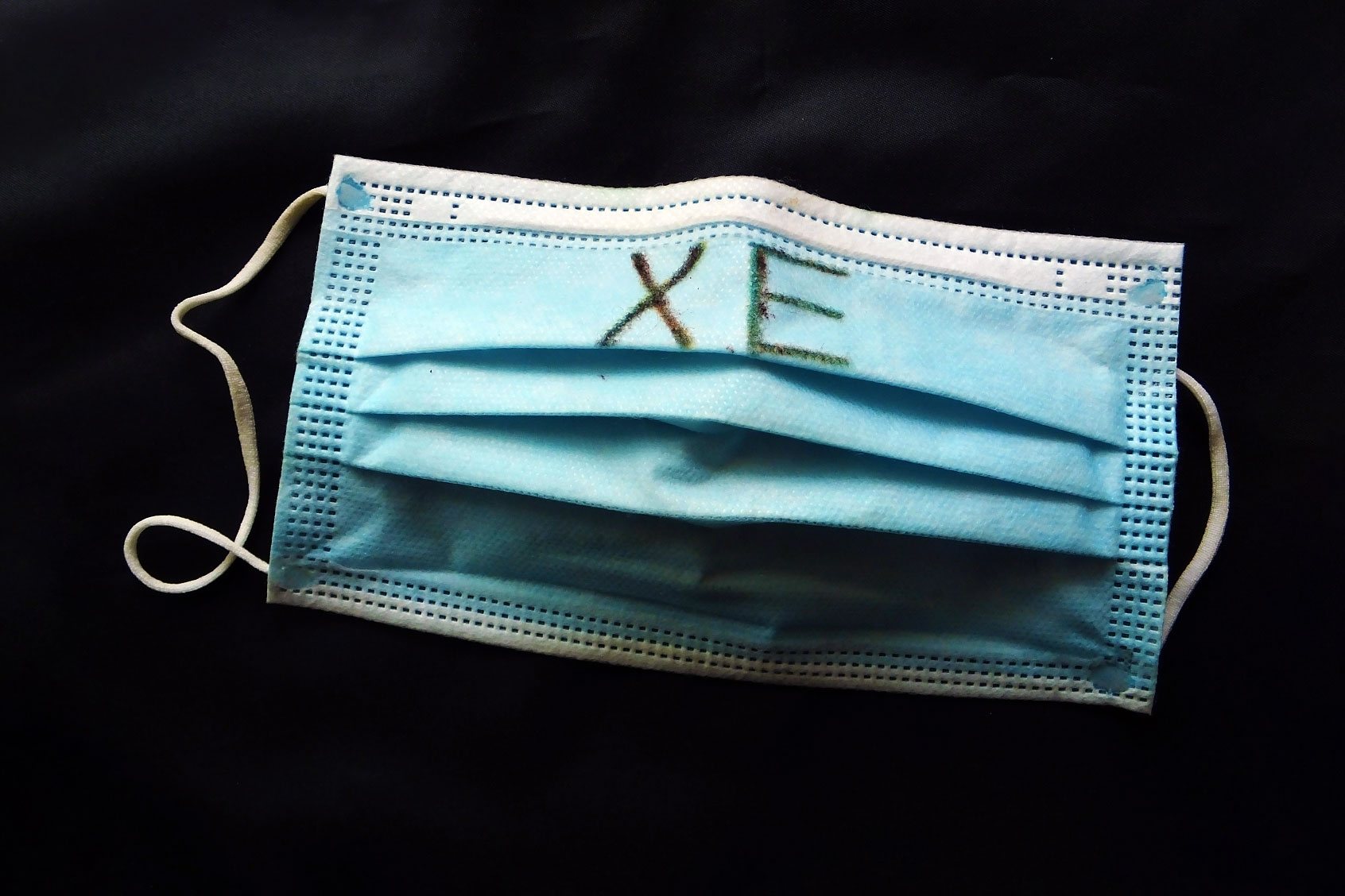 A mask with the word XE mutated virus written on it in Yichang, Hubei province, April 2, 2022. (Costfoto/Future Publishing via Getty Images)