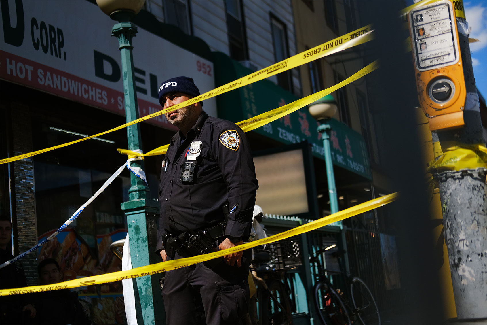 Police gather at the scene of a shooting at the 36 St subway station on April 12, 2022 in the Brooklyn borough of New York City. According to authorities, at least 29 people were reportedly injured, including 10 with gunshot wounds, during a shooting at the 36th Street and Fourth Avenue station in the Sunset Park neighborhood. (Spencer Platt/Getty Images)