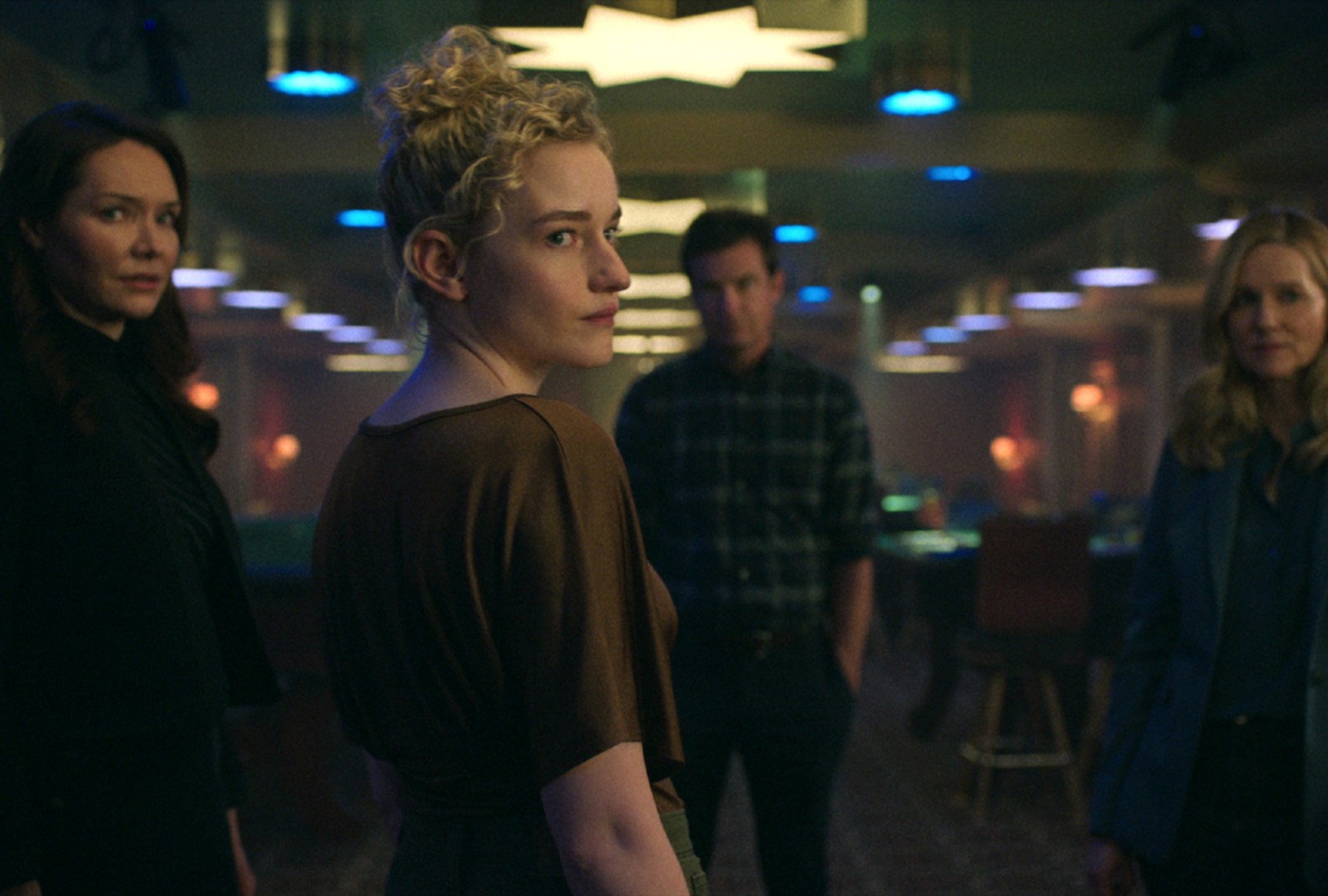 Katrina Lenk as Clare Shaw, Julia Garner as Ruth Langmore, Jason Bateman as Marty Byrde, Laura Linney as Wendy Byrde (COURTESY OF NETFLIX)
