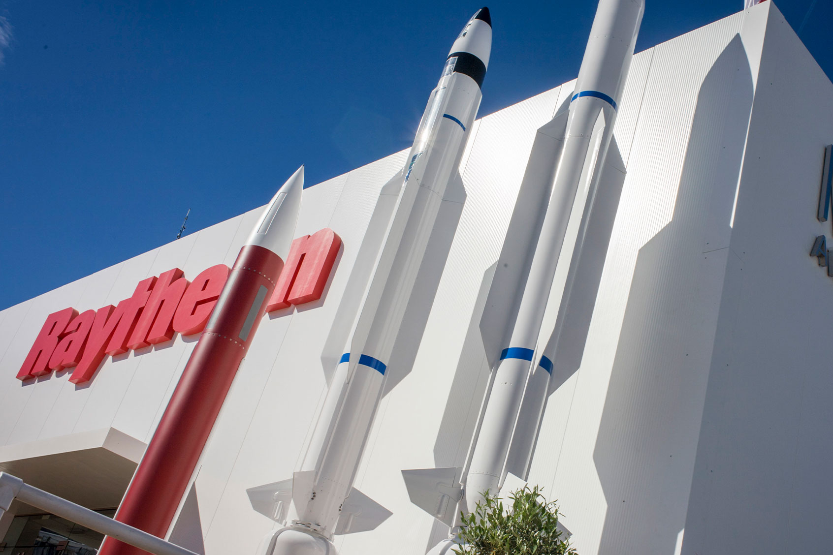 Defence manufacturer Raytheon exhibition stand at the Farnborough Air Show, England. (In Pictures Ltd./Corbis via Getty Images)