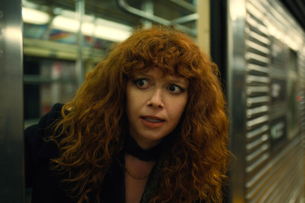 Natasha Lyonne as Nadia aboard a subway train in Russian Doll