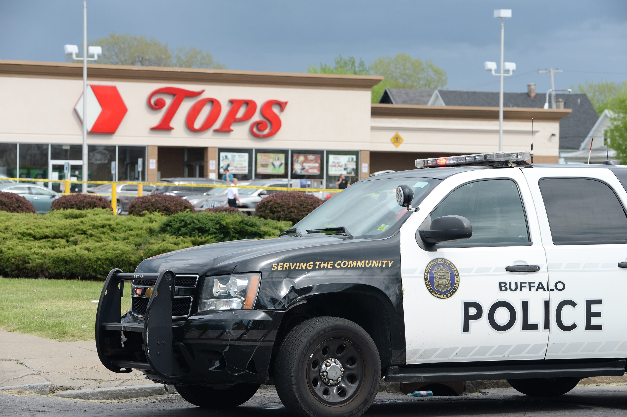 Police on scene at a Tops Friendly Market on May 14 in Buffalo, New York. At least 10 people were killed after a mass shooting at the store. The shooter is in police custody. (John Normile/Getty Images)