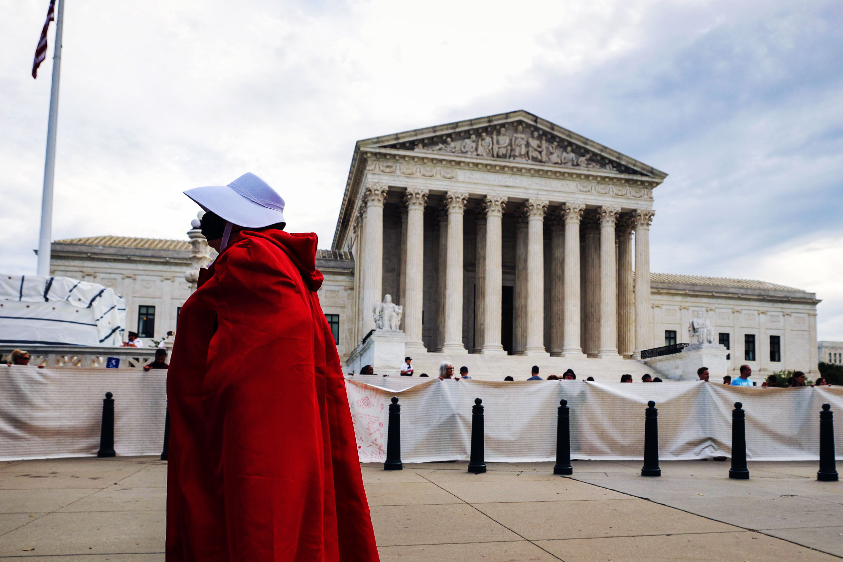 A Pro-choice activist dressed in a Handmaid costume as they demonstrate outside the Supreme Court in Washington, DC. (Kevin Dietsch/Getty Images)