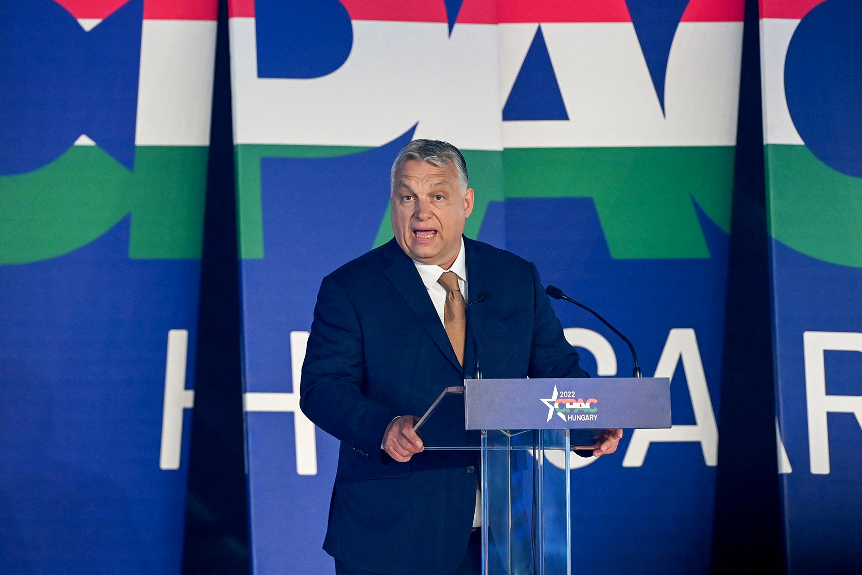 Hungarian Prime Minister Viktor Orban addresses a keynote speech during an extraordinary session of the Conservative Political Action Conference (CPAC) at the Balna cultural centre of Budapest, Hungary on May 19, 2022. (ATTILA KISBENEDEK/AFP via Getty Images)