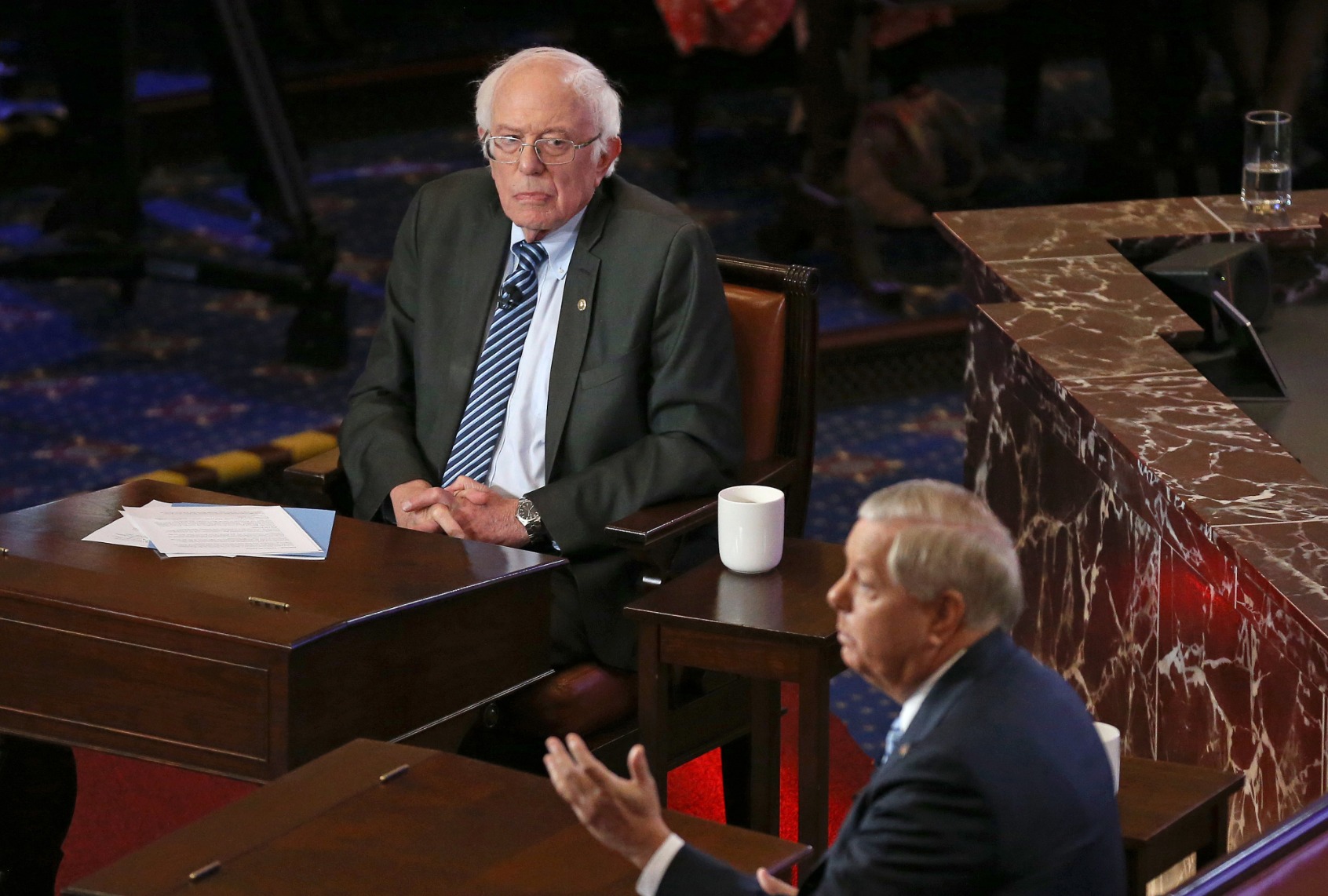 Senator Bernie Sanders debates Senator Lindsey Graham at the Edward M. Kennedy Institute on June 13, 2022 in Boston, Massachusetts. (Photo by Matt Stone/MediaNews Group/Boston Herald via Getty Images)