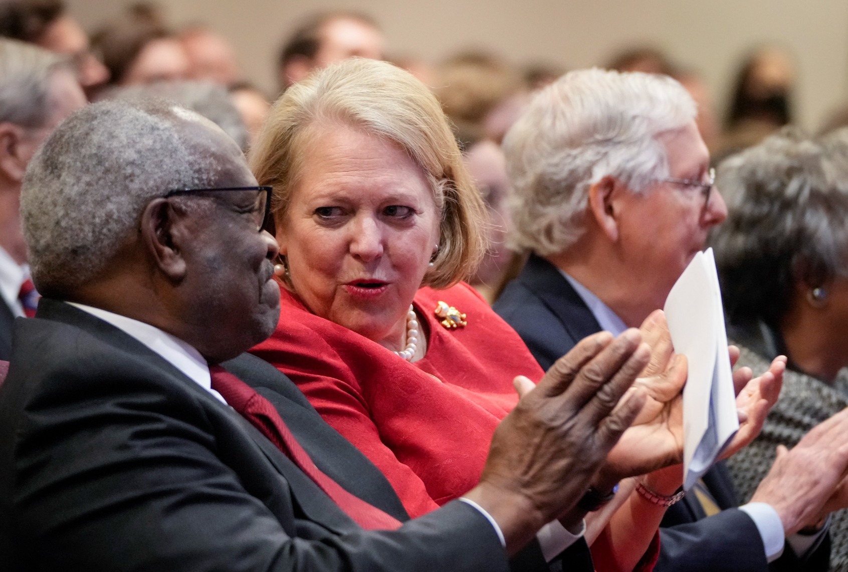 Supreme Court Justice Clarence Thomas sits with his wife and conservative activist Virginia Thomas while he waits to speak at the Heritage Foundation on October 21, 2021 in Washington, DC. (Drew Angerer/Getty Images)